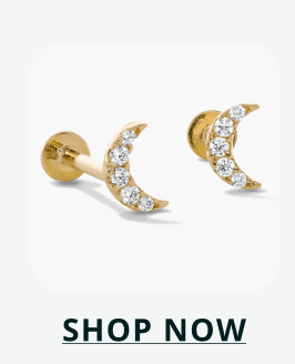 Crescent moon studs adorned with shimmering stones. Click here to shop now