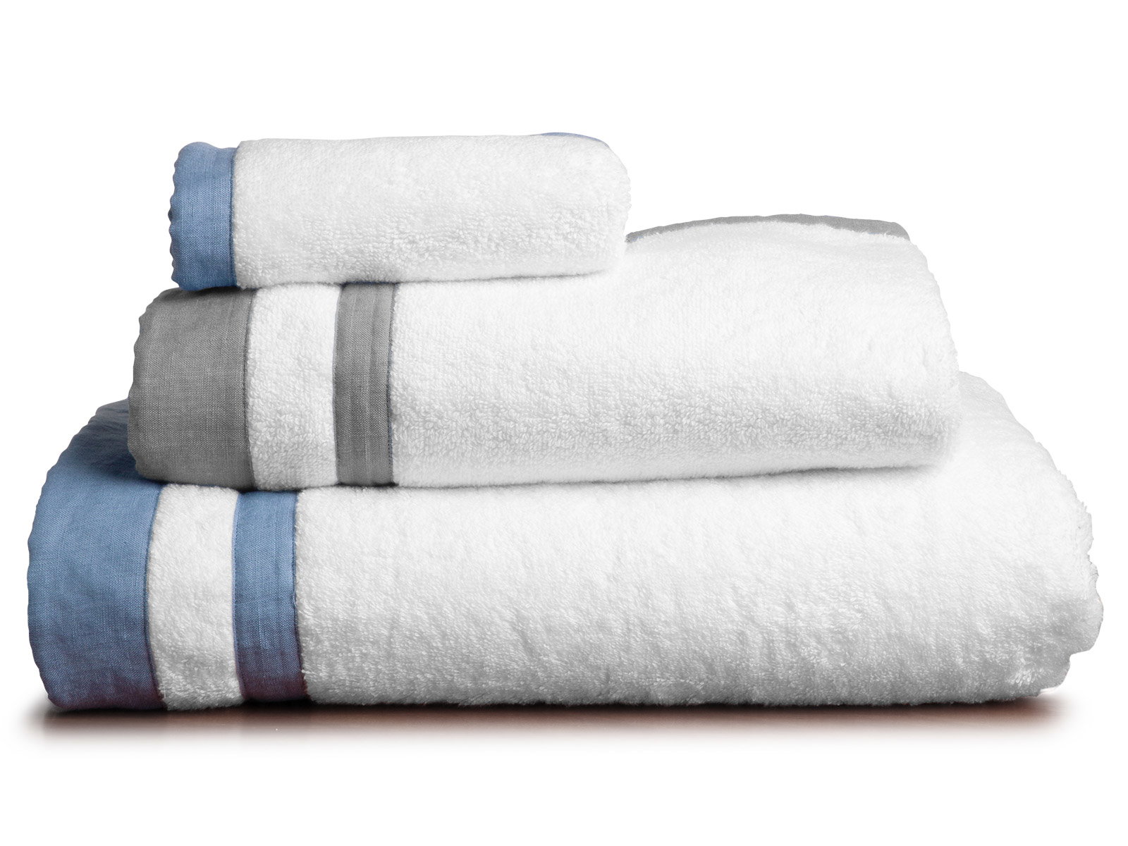 Italian made with 100% terry cotton, exceptional absorbency and durability. Finished with stunning Blue or Gray linen inserts and borders. Matching shower curtains