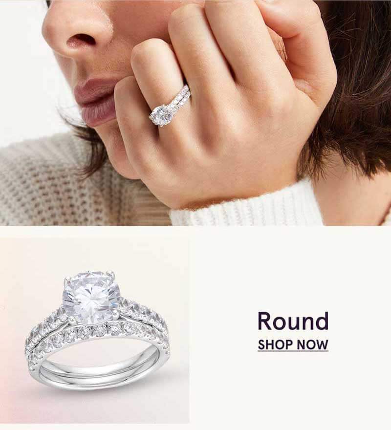 Square-cut center diamond ring framed by diamonds. Princess.  Click here to shop now