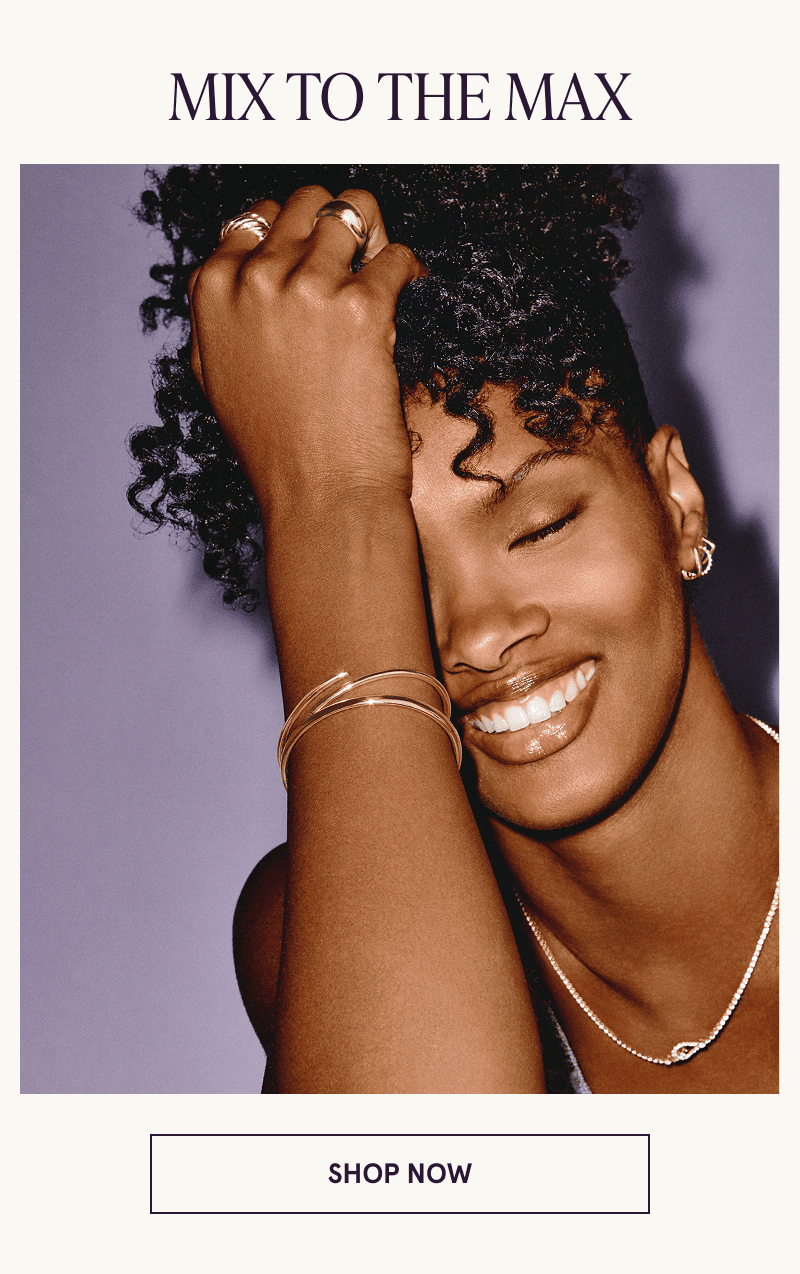 A model wearing gold diamond jewelry. Mix to the max. Click here to shop now