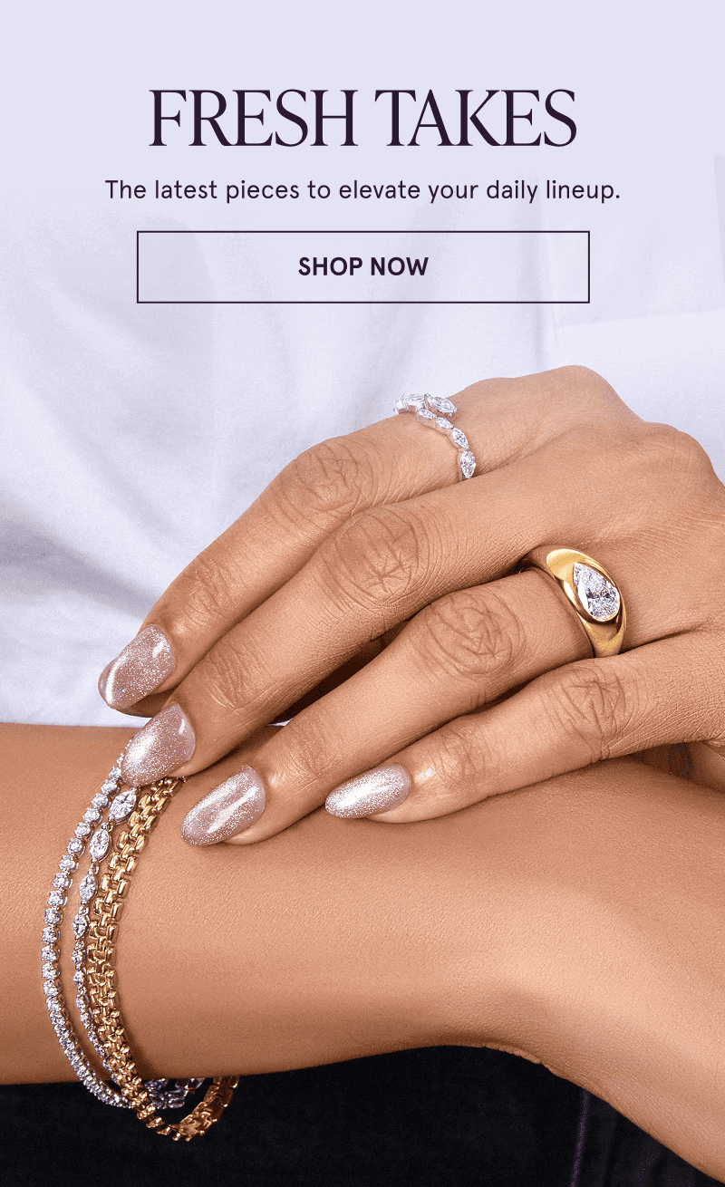 A model wearing gold, white metal and diamond jewelry. The latest pieces to elevate your daily lineup. Click here to shop now