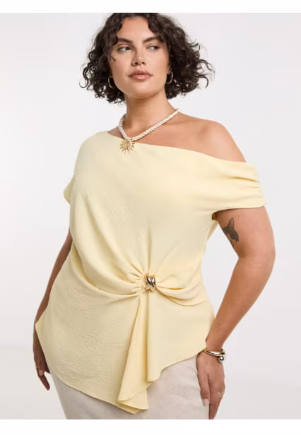 New in top in lemon yellow