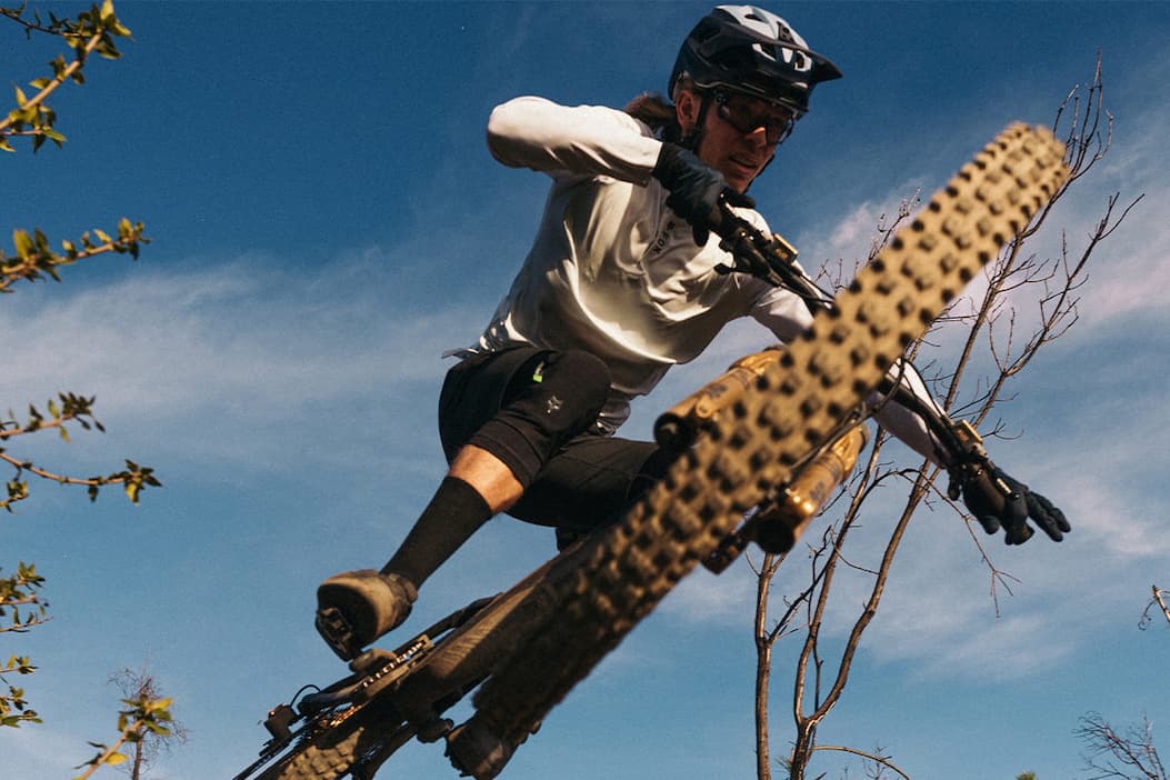 Image of a man riding off a jump