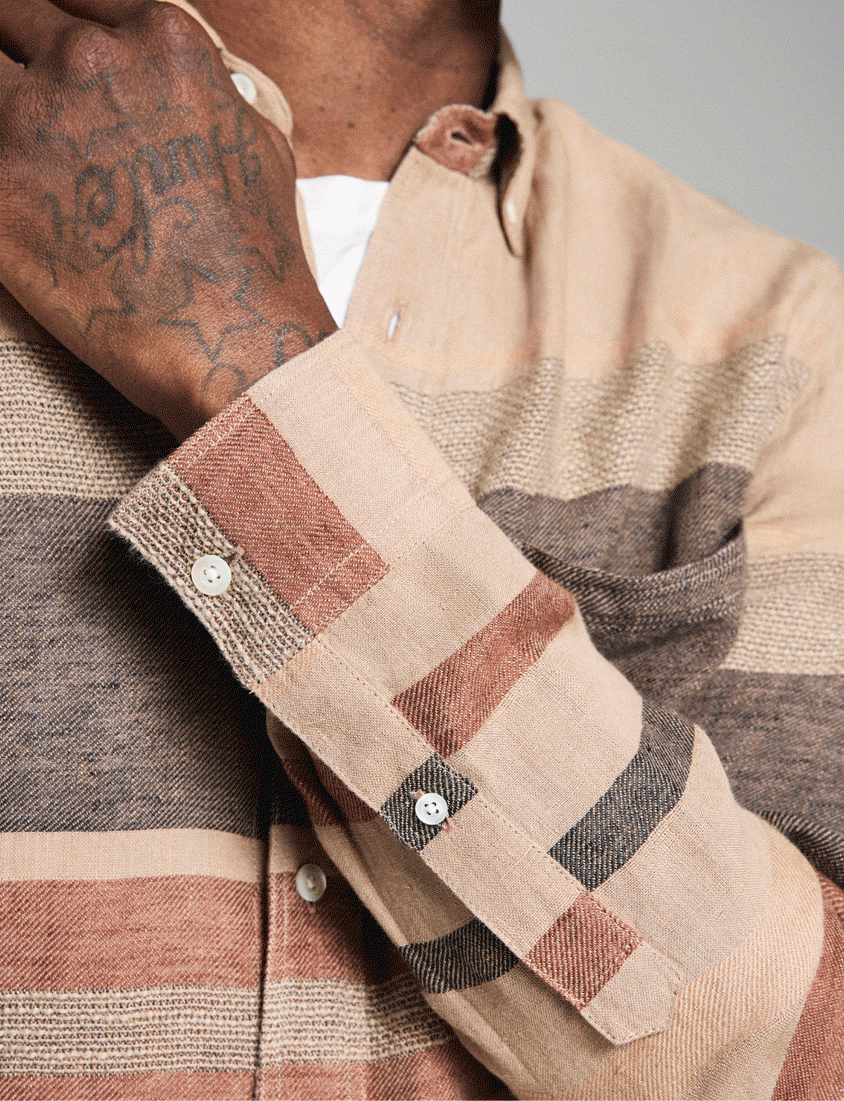 Models wear linen tuscumbia shirts.