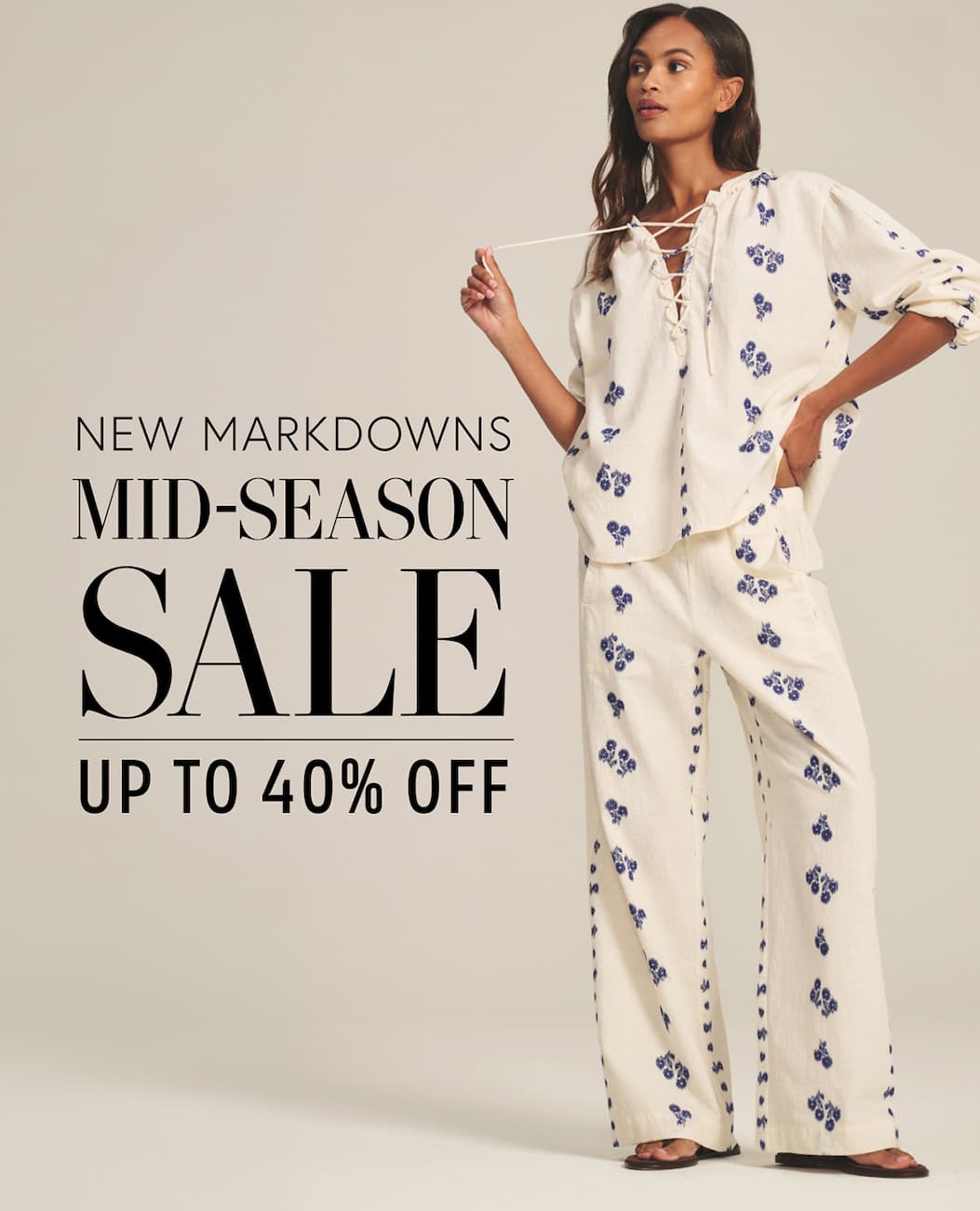 Image shows a model wearing the Winslet Top in Cream/Cobalt. Text reads: New Markdowns. Mid-Season Sale.