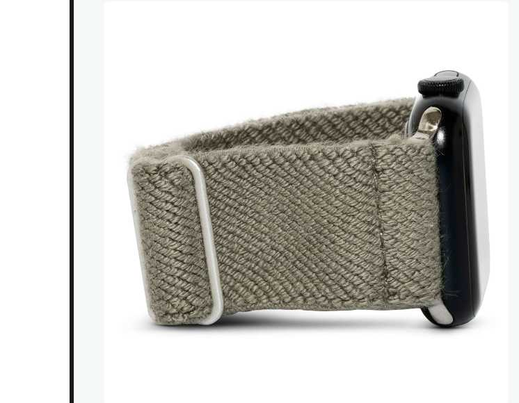 Close-up of an Apple Watch with a sleek gray organic cotton Braxley band (Ash).