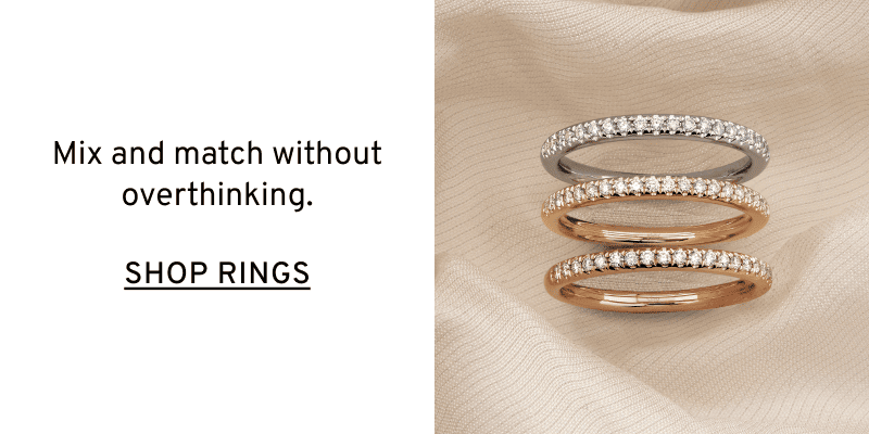 Three diamond rings in different colors on fabric. Mix and match without overthinking. Click to Shop Rings