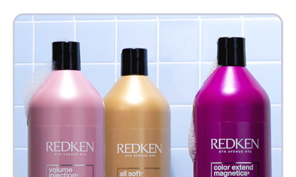 Redken liters in shower with soap suds