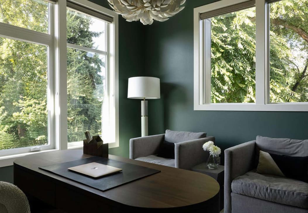 Home office featuring moody green paint color Current Mood