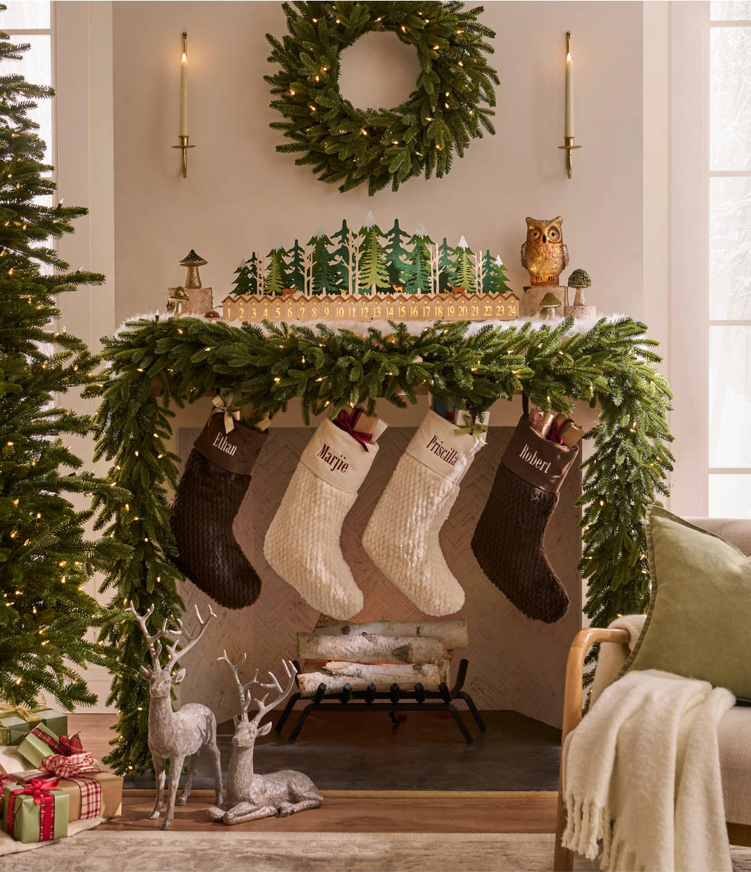 A beautifully decorated front room with wreaths, stockings, and an advent calendar