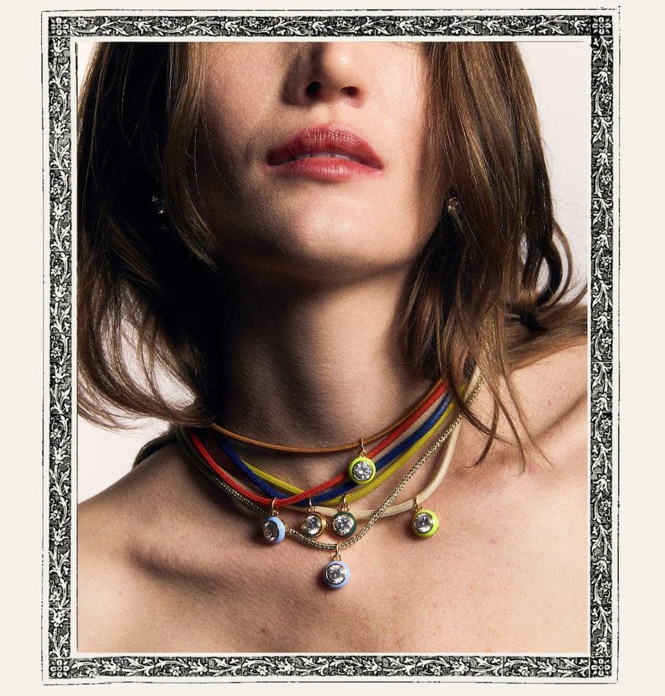 Model wearing stacked cord necklaces with Bezel Charms