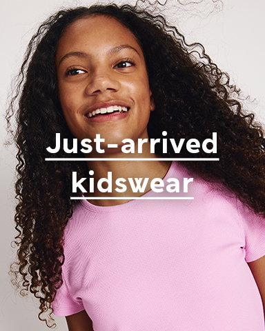 Girl wearing Cotton Rich Ribbed Fitted Crop T-Shirt in Soft Magenta