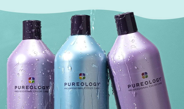 Water pouring over Pureology liters