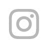 A close-up, flat-lay shot of the Instagram logo in a light gray outline against a white background.