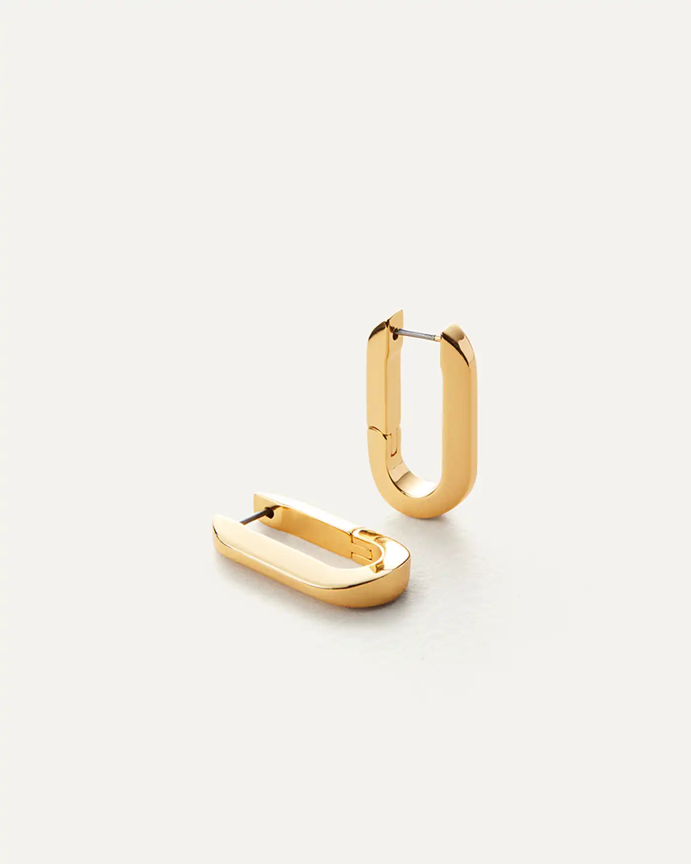 Your new go-to modern hoop earrings. The chunky U-Link shape and endless surface of shine make for an ultra wearable pair. They work with everything i...