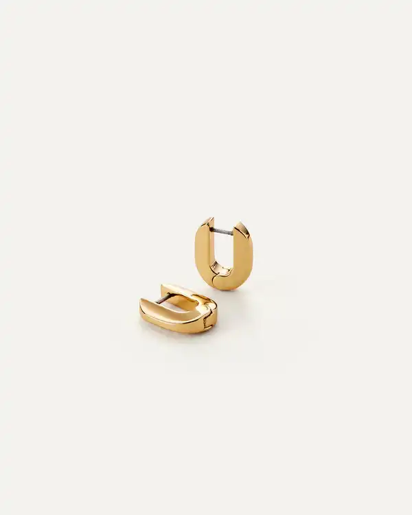 These best selling, wear-with-everything tiny huggie hoop earrings complete your ear stack, but are bold enough to be worn alone. They open and close ...
