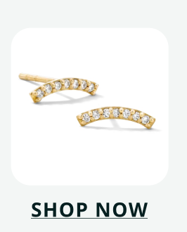 Curved gold bar studs shaped to follow the contour of ear & embedded with row of diamonds. Click here to shop now