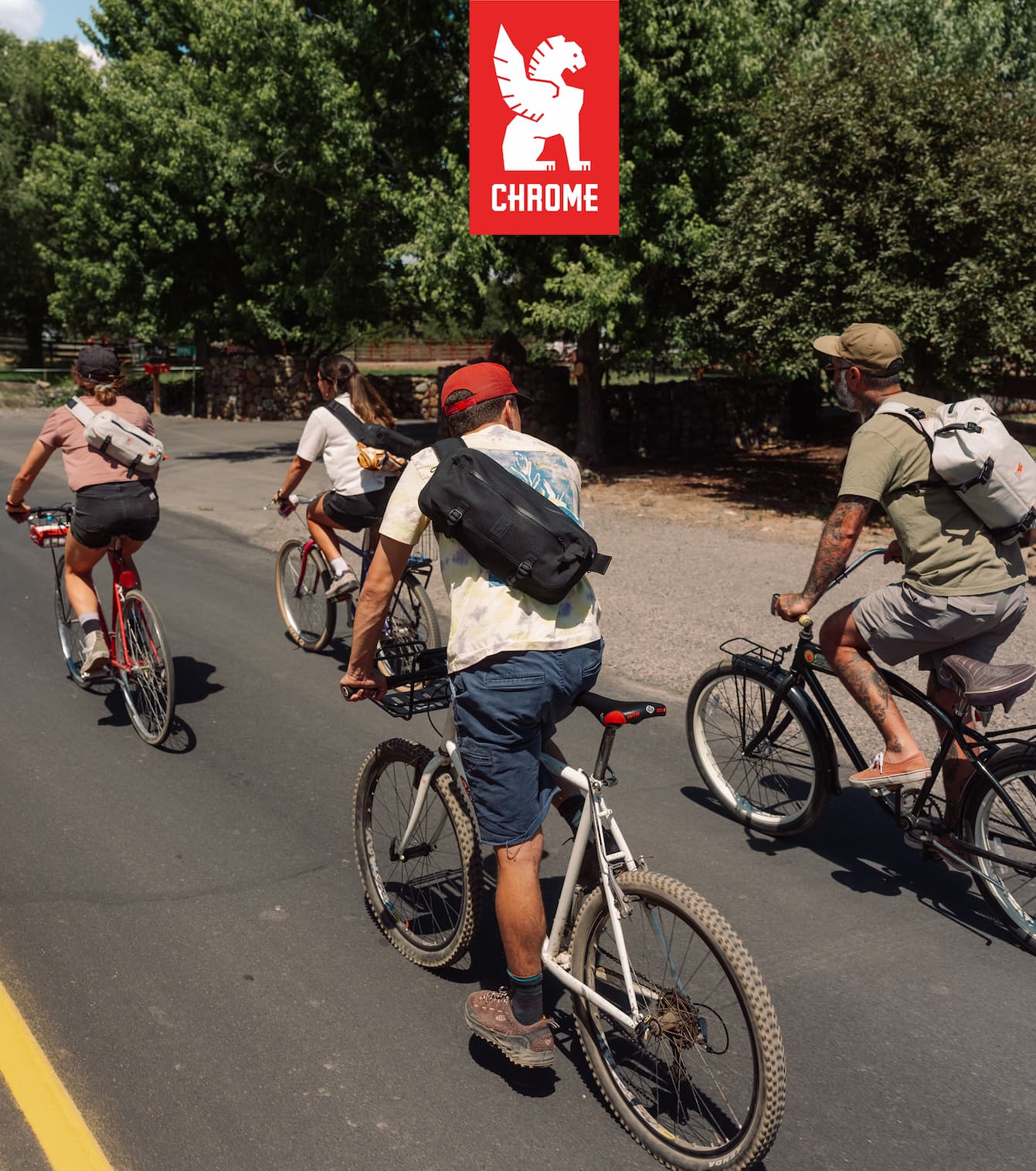 People on bikes carrying Waterproof Kadets in black and white