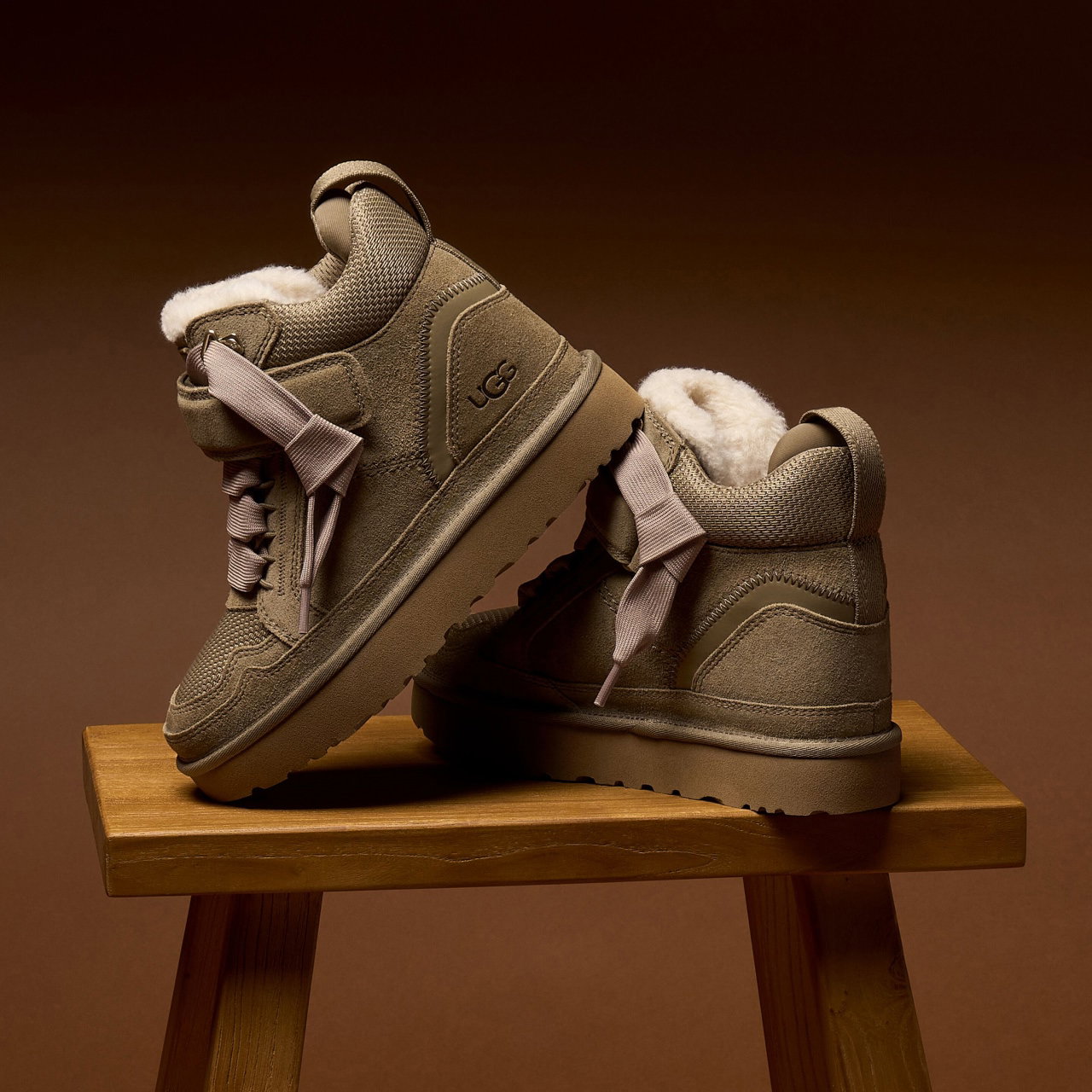 Lowmel Wedge styled on a wooden stool.