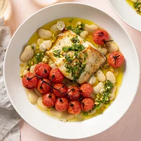 Black Cod with Charred Tomatoes, Stewy Beans, and Tarragon-Pistachio Pesto
