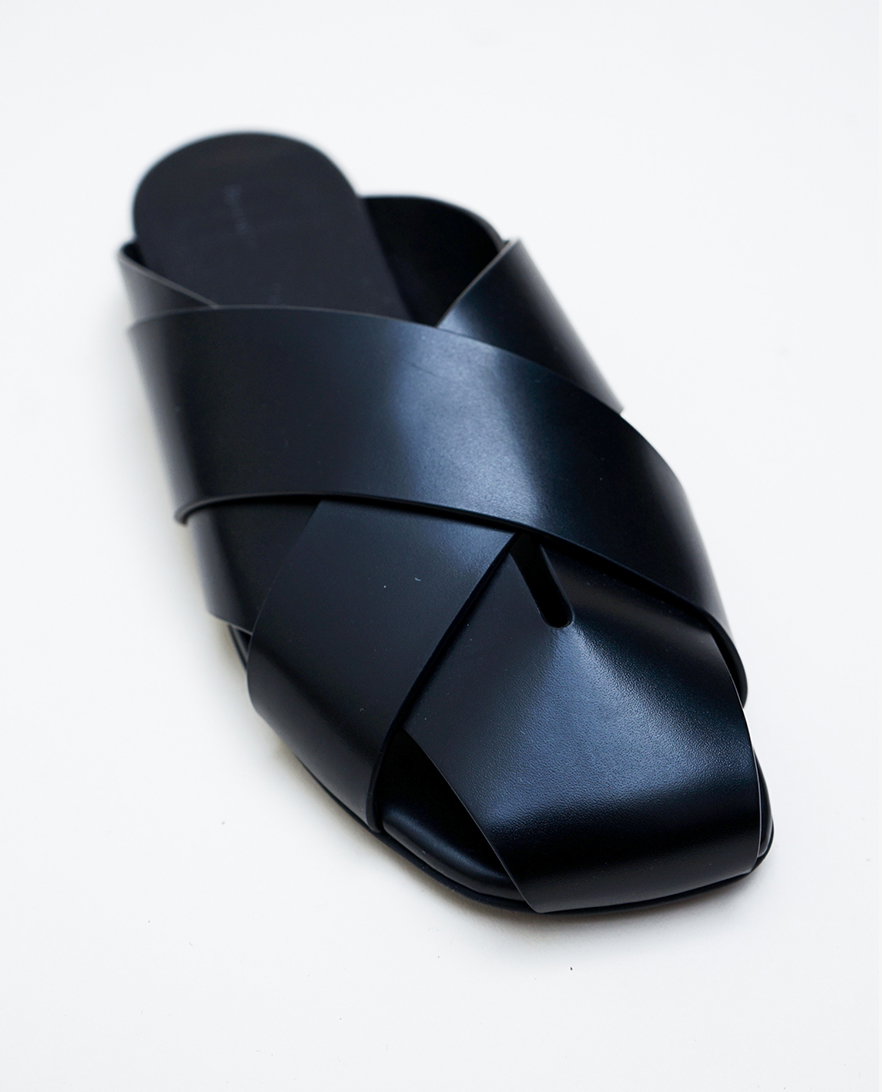 Still Life Image of Slant Cross Slides in Brushed Calf in black