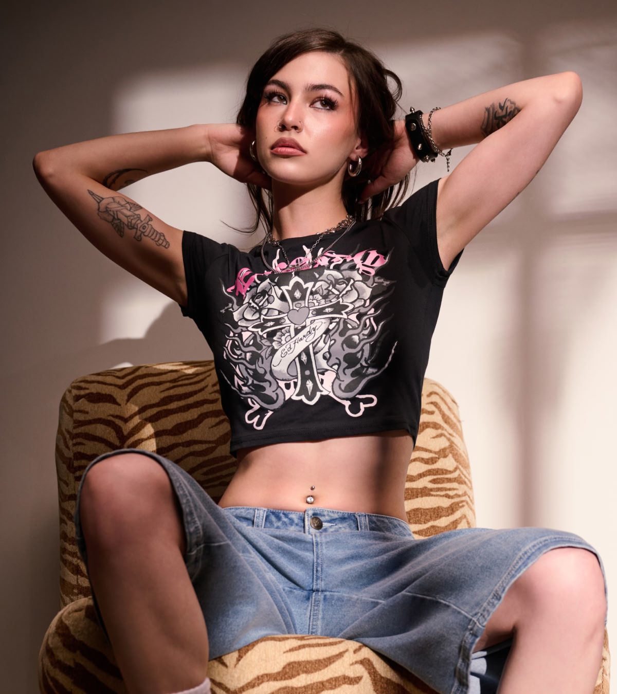 Shop women's tees, including graphic crop tops from Ed Hardy