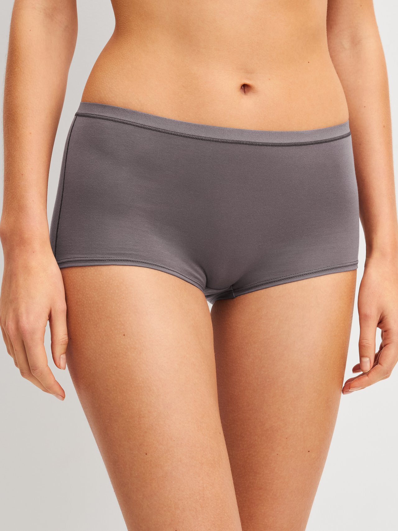 Women model is wearing Shorty regular cut made of Cotton in Brown, Unicoloured from the Natural Comfort series by CALIDA, Front view