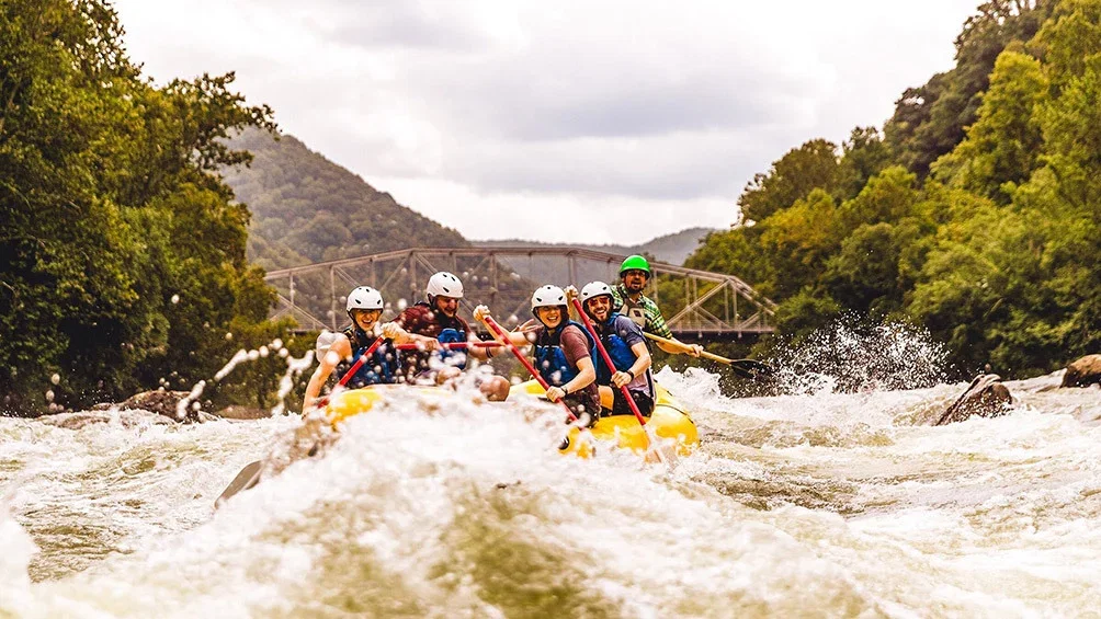 Image description: Whitewater rafters at New River Gorge, Lansing, West Virginia.
