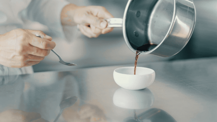 GIF: Chef Corey Lee pouring sauce from Hestan pan