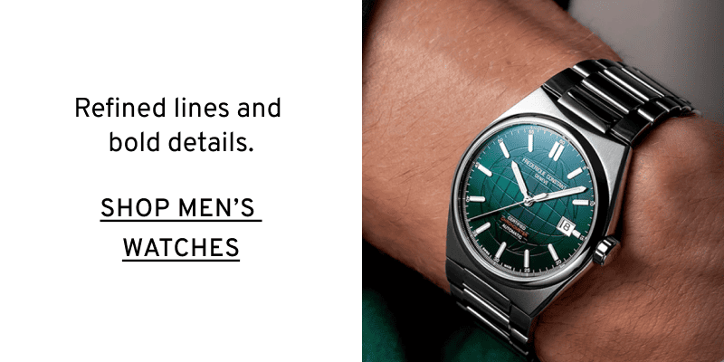 Green dial watch on men’s wrist. Refined lines and bold details. Click to Shop Men's Watches