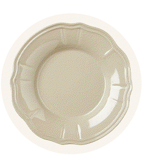 A cream plate with a wobbly edge.