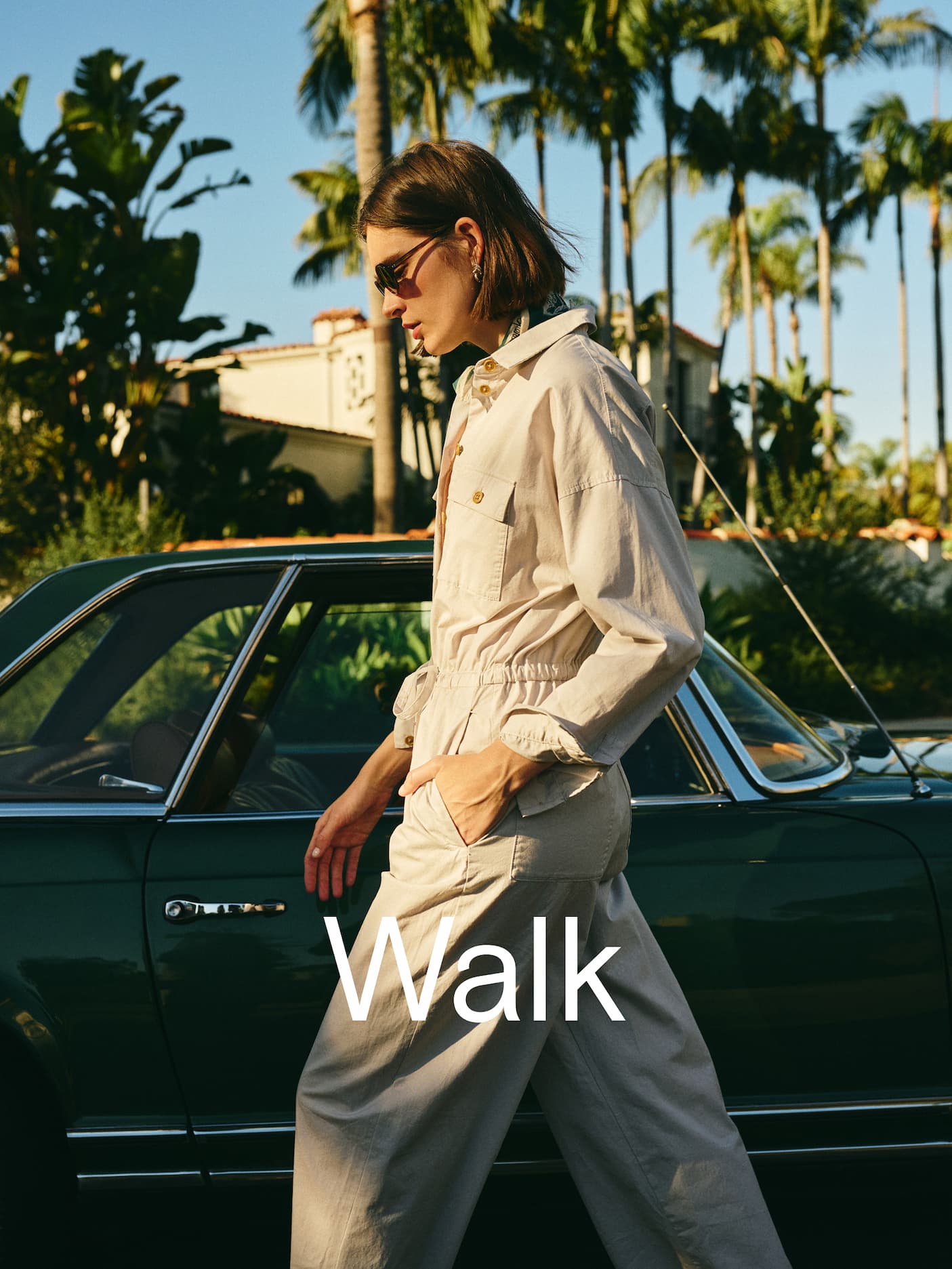 Woman in jumpsuit with word "Walk" over top