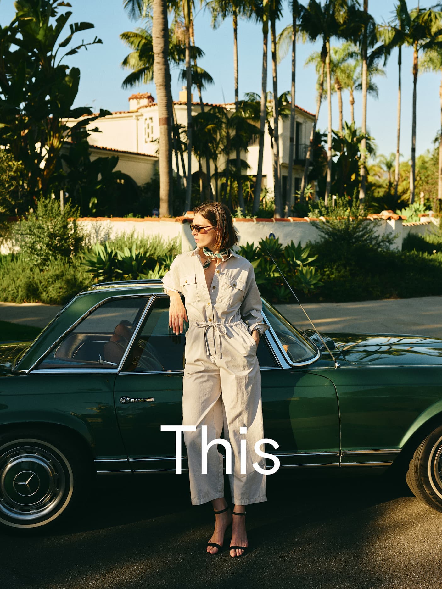 Woman in jumpsuit with word "This" over top