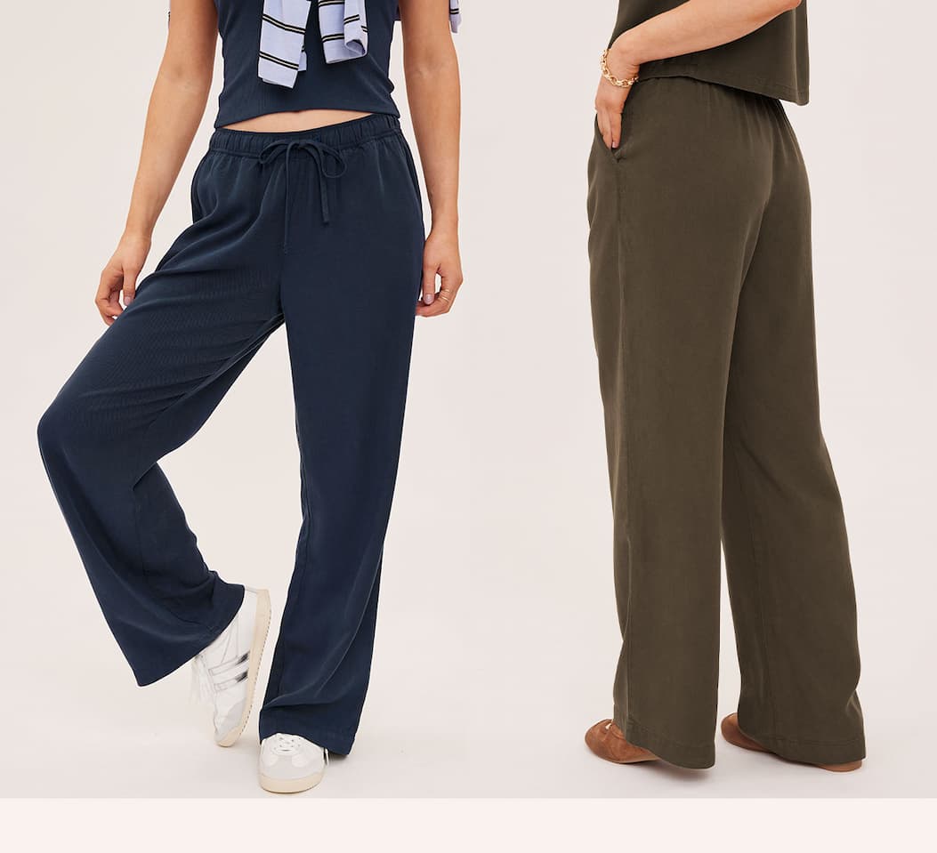 Gabriel wide-leg pants shown in navy and olive colorways with matching tops.
