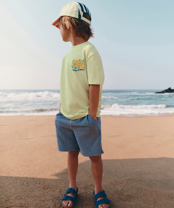 Boy wearing a Yellow Mix Pure Cotton T-Shirt And Shorts Outfit