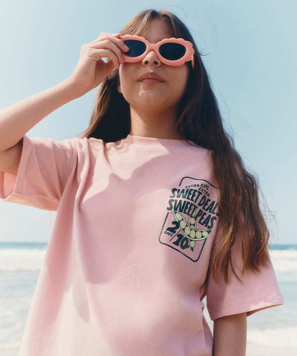 Girl wearing a Magenta Cotton Rich Sweet Pea Graphic T-Shirt