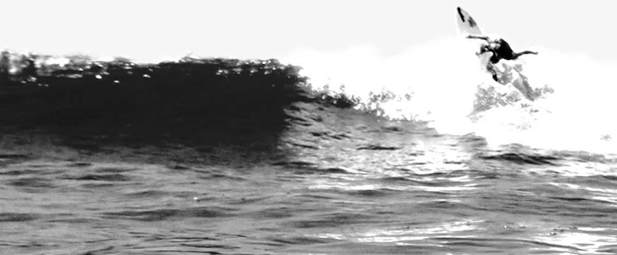 black and white 90's era graphic of surfer in the water