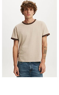 Man wearing beige and brown short sleeve t-shirt