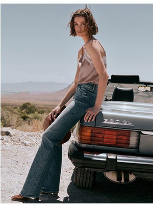 Mid Rise Medium Wash Bootcut Jeans