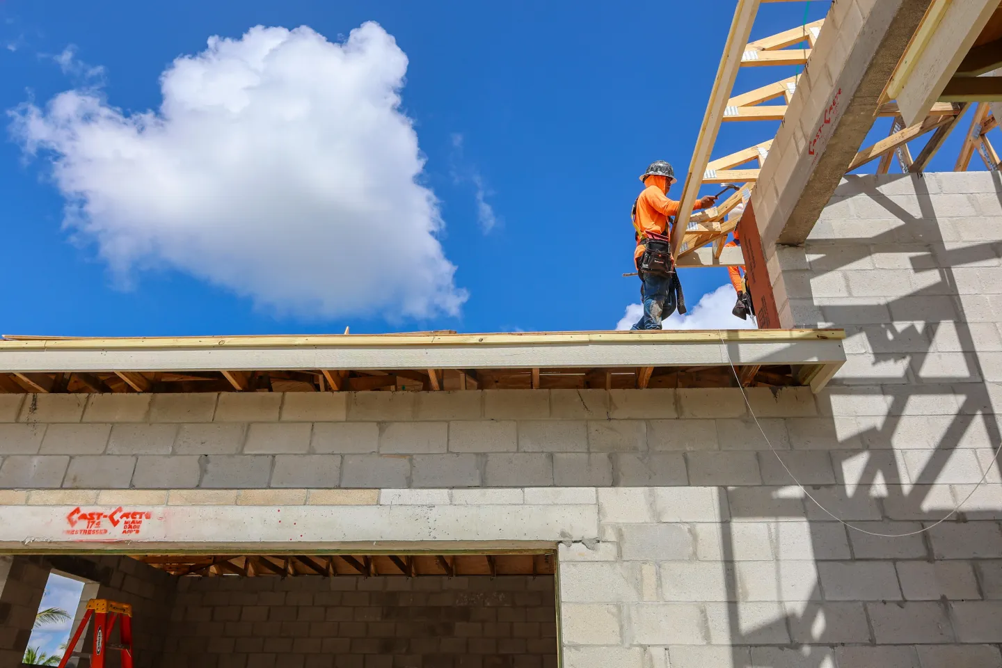 Workers install roofing for a new home under construction in Palm Beach Gardens, Florida, on Monday, June 29, 2026. Bloomberg via Getty Images