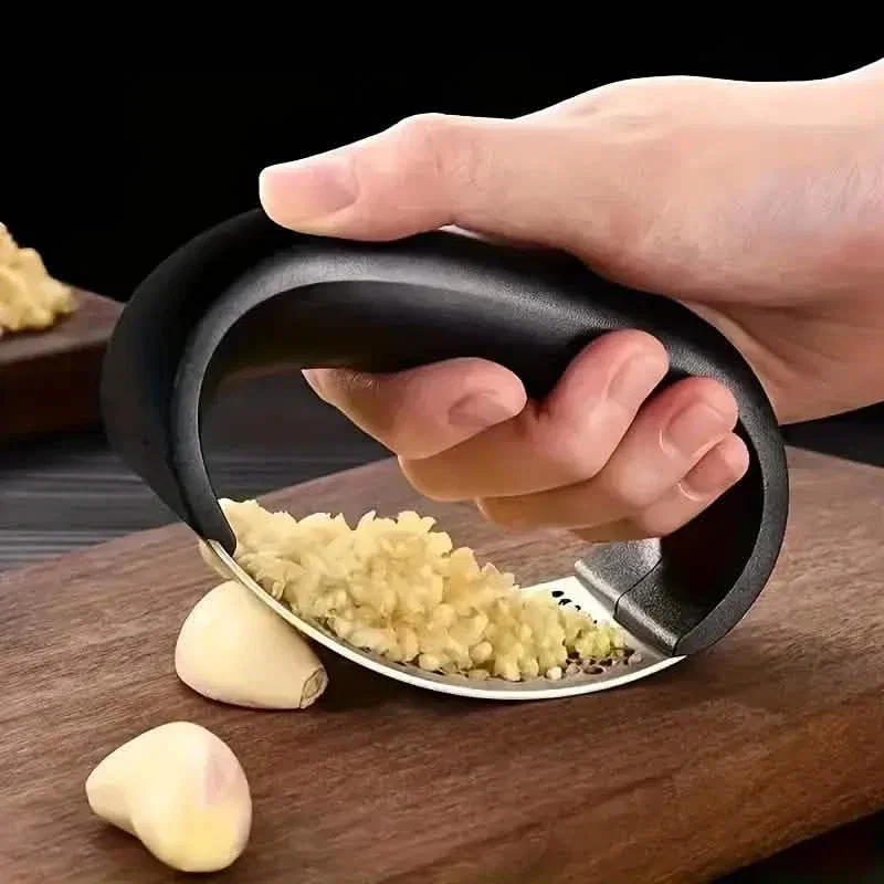 Image of Premium Stainless Steel Garlic Rocker Press - Compact, Durable, and Rust-Resistant Kitchen Gadget