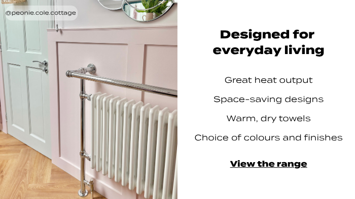 White column radiator with a chrome towel rail mounted against a pink wall, with promotional text describing space-saving design, heat output, and warm, dry towels.