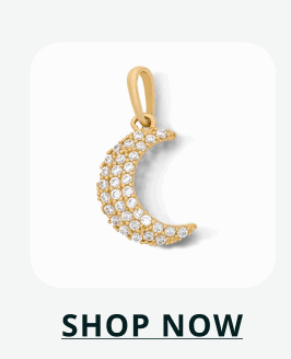 Gold pavé half moon pendant. Click here to shop now