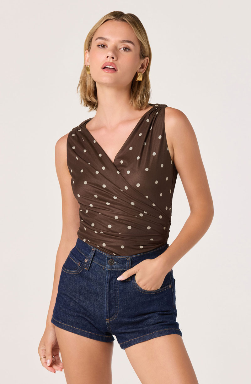 Woman Wearing Faux-Wrap Bodysuit