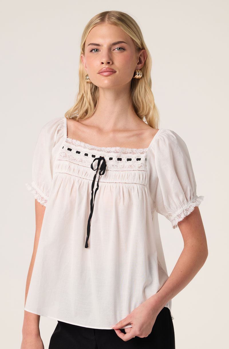 Woman Wearing Lace Trim Babydoll Top