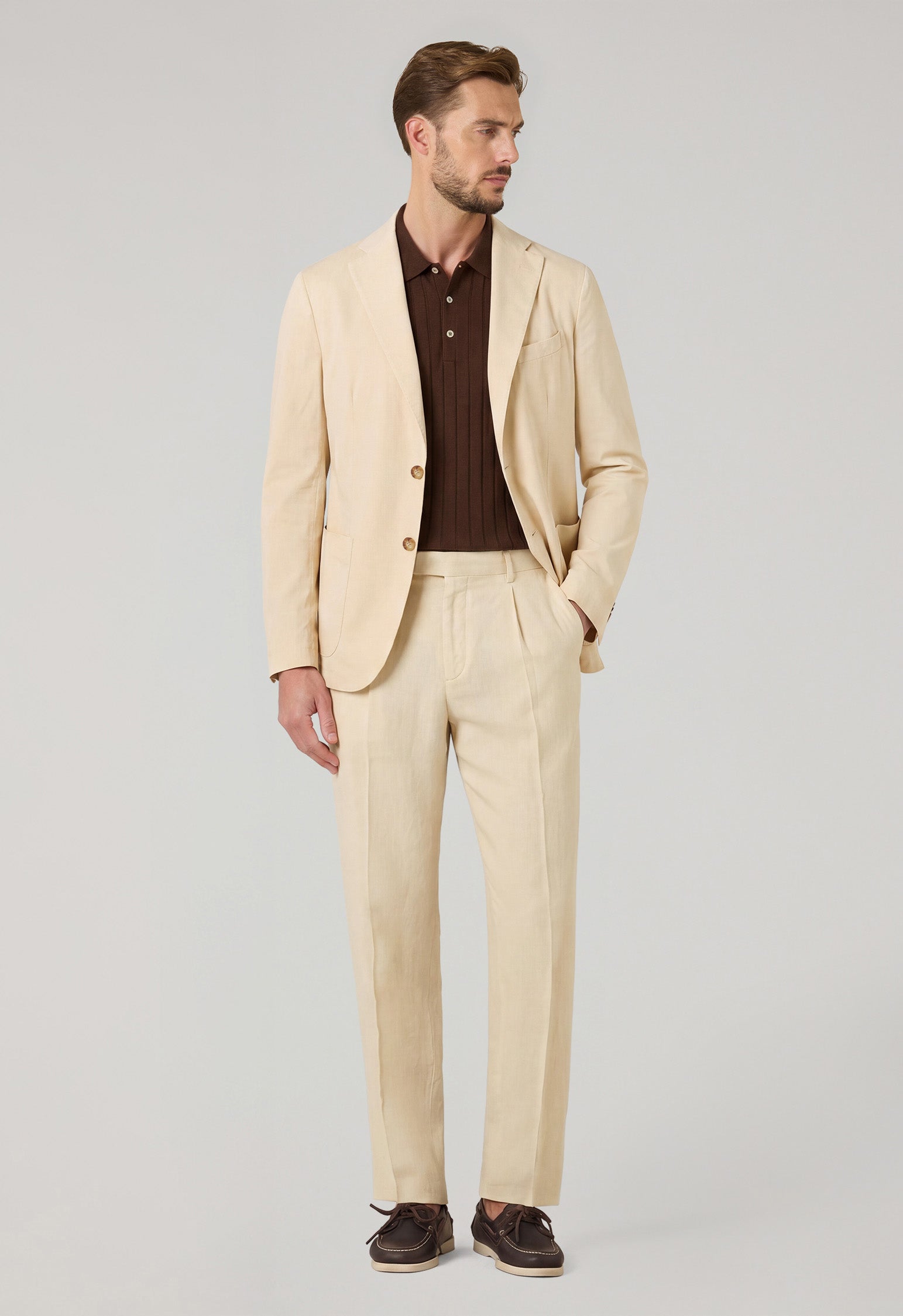 man with cream suit