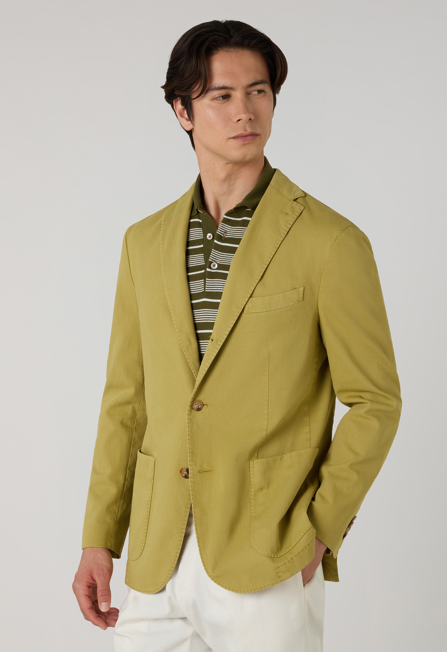 man with green k-jacket
