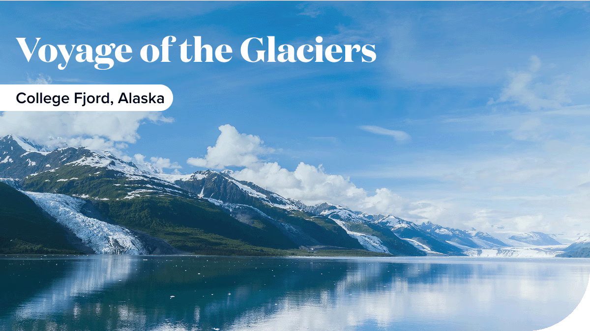 Blue skies and snowcapped mountains in College Fjord, Alaska.