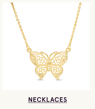 Gold intricate, open-work filigree butterfly pendant suspended from chain. Click here to shop necklaces