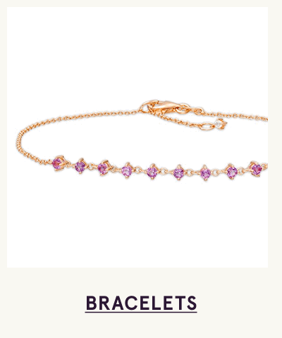 Dainty, rose gold bracelet lined with row of small pink gemstones. Click here to shop bracelets